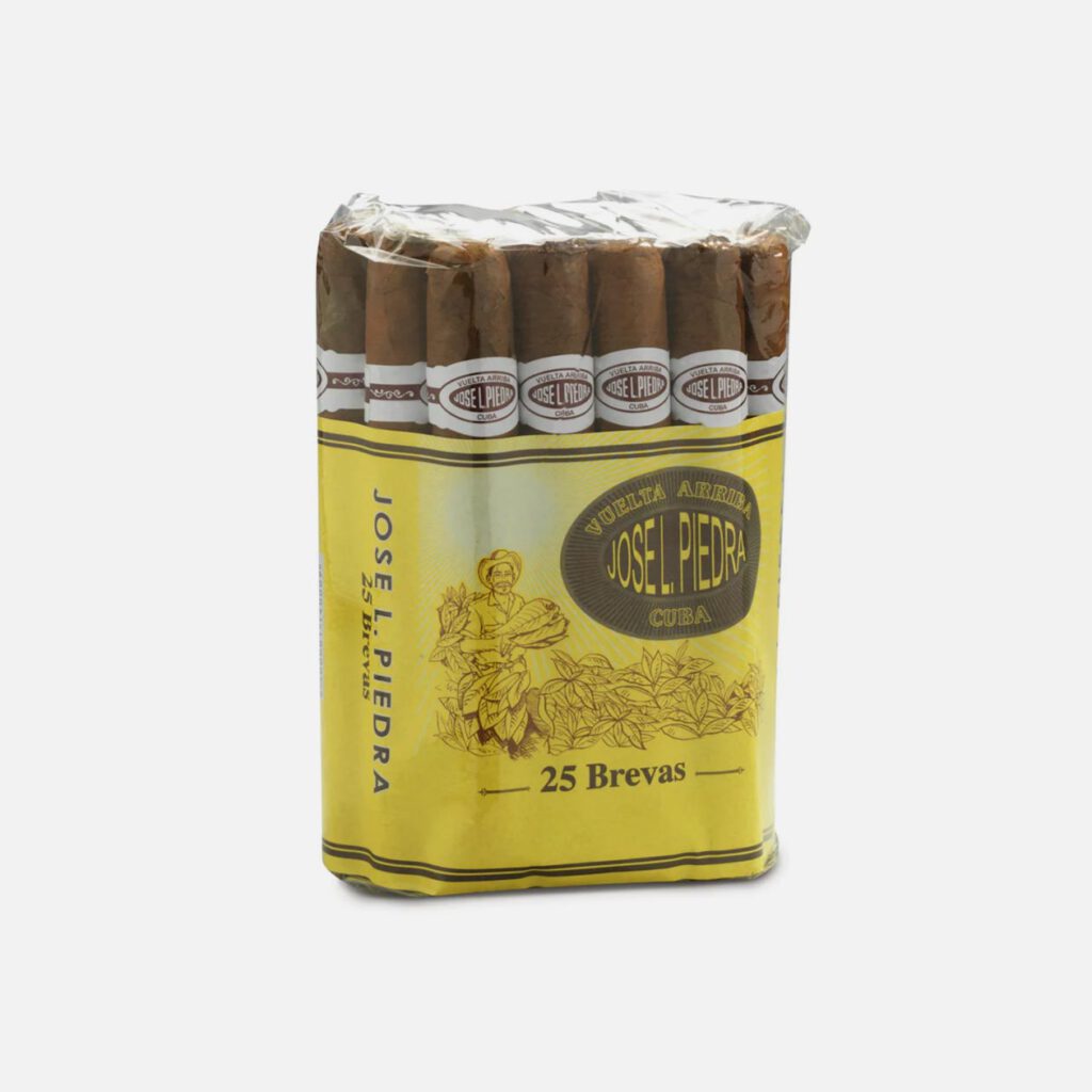 José L. Piedra 25 Brevas, Cuban cigars in yellow packaging.