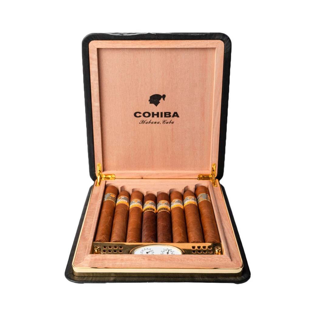 Cohiba cigars in an elegant wooden box with gold accents.