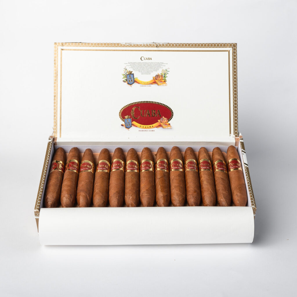 Cuaba cigars in an elegant, open presentation box.