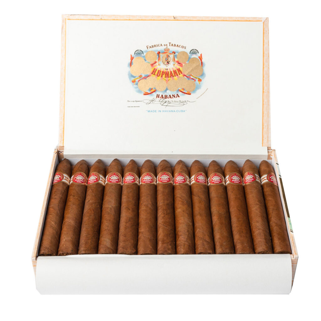 H. Upmann Cuban torpedo cigars in elegant white box.