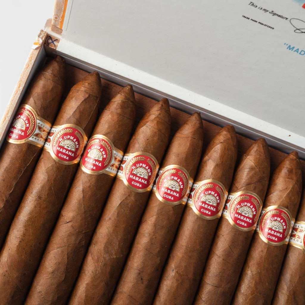 H. Upmann Habana Cuban cigars with sleek, classic presentation.