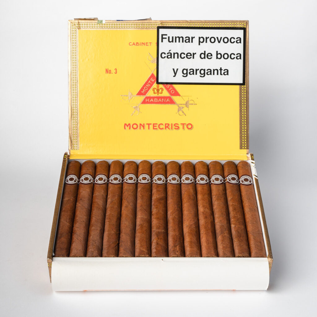 Montecristo No. 3 cigars in an elegant yellow box display.